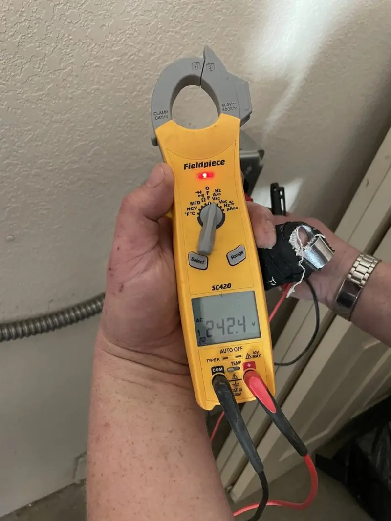 Voltage testing with clamp meter during Generator Installation in Fort Meade